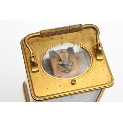 860 - A LATE 19TH CENTURY FRENCH BRASS REPEATER CARRIAGE CLOCK. by Henri Jacot,having a white enamel Roman... 