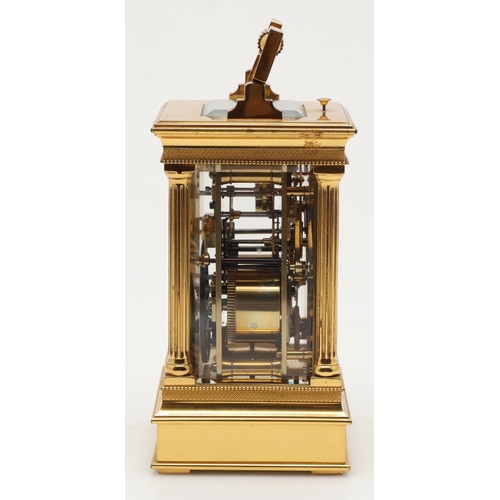 861 - A 19TH CENTURY FRENCH STRIKE REPEATER BRASS CARRIAGE CLOCK. the circular enamel dial with Roman nume... 