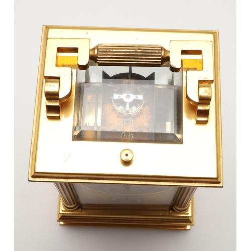 861 - A 19TH CENTURY FRENCH STRIKE REPEATER BRASS CARRIAGE CLOCK. the circular enamel dial with Roman nume... 