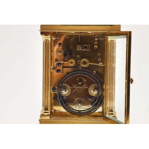 861 - A 19TH CENTURY FRENCH STRIKE REPEATER BRASS CARRIAGE CLOCK. the circular enamel dial with Roman nume... 