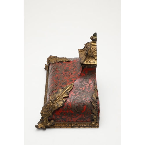 868 - A 19TH CENTURY FRENCH BOULLE CLOCK BRACKET. the red tortoiseshell with decorative scrolling brass in... 
