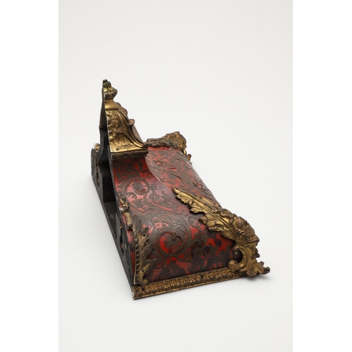 868 - A 19TH CENTURY FRENCH BOULLE CLOCK BRACKET. the red tortoiseshell with decorative scrolling brass in... 