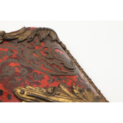 868 - A 19TH CENTURY FRENCH BOULLE CLOCK BRACKET. the red tortoiseshell with decorative scrolling brass in... 