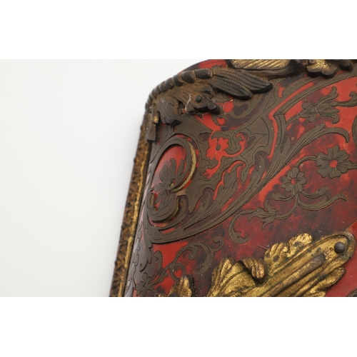 868 - A 19TH CENTURY FRENCH BOULLE CLOCK BRACKET. the red tortoiseshell with decorative scrolling brass in... 