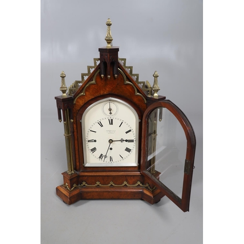 869 - A VICTORIAN WALNUT CHIMING BRACKET CLOCK. the 6 3/4