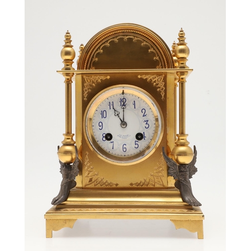 871 - A FRENCH NEO-CLASSICAL GILT BRASS CLOCK GARNITURE. 19th century, the painted enamel dial signed J W ... 