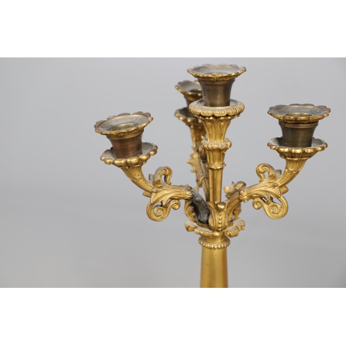 873 - A 19TH CENTURY FRENCH ORMOLU FIGURAL MANTEL CLOCK GARNITURE. in the Louis XVI style, the two train c... 