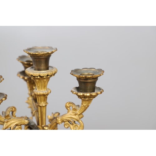 873 - A 19TH CENTURY FRENCH ORMOLU FIGURAL MANTEL CLOCK GARNITURE. in the Louis XVI style, the two train c... 