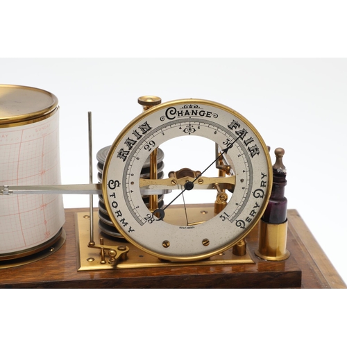 876 - AN EARLY 20TH CENTURY OAK CASED BAROGRAPH. possibly by Short & Mason of London, the bevelled glass c... 