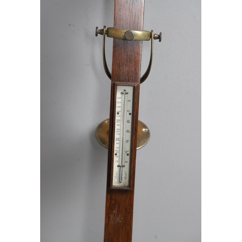 877 - A 19TH CENTURY ROSEWOOD MARINE STICK BAROMETER. the ivory dial signed James Turkill, Middlesborough,... 