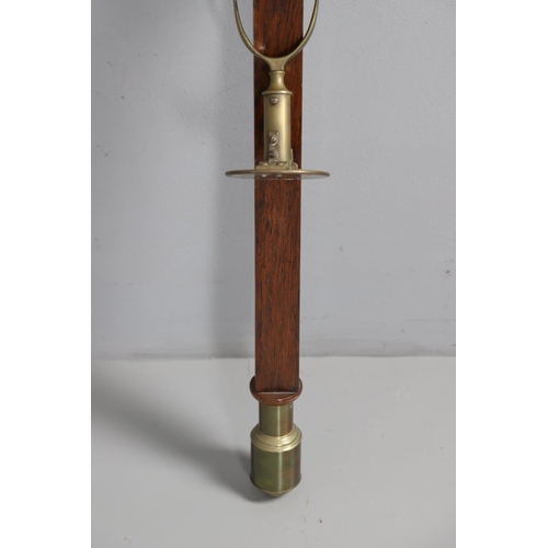 877 - A 19TH CENTURY ROSEWOOD MARINE STICK BAROMETER. the ivory dial signed James Turkill, Middlesborough,... 