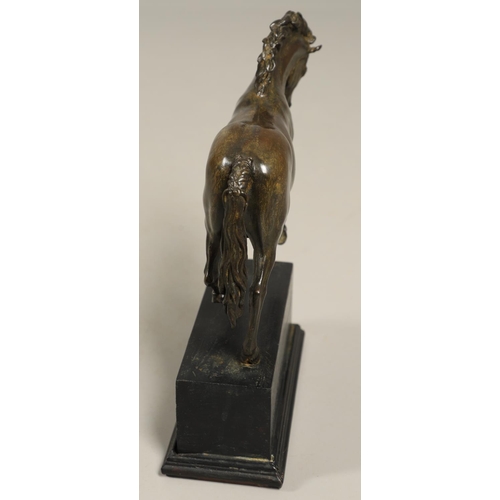 878 - AFTER GIAMBOLOGNA (1529-1608), BRONZE OF A PACING HORSE. early 20th century, light brown patina, upo... 