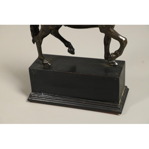 878 - AFTER GIAMBOLOGNA (1529-1608), BRONZE OF A PACING HORSE. early 20th century, light brown patina, upo... 