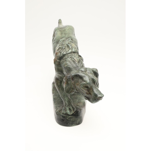 879 - AFTER THOMAS FRANCOIS CARTIER (1879 - 1943). bronze of a Setter, with green painted finish, signed T... 
