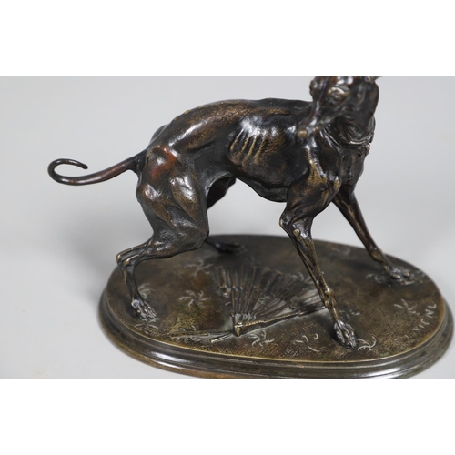 880 - PIERRE-JULES MENE (1810-1879). a 19th century bronze of a Whippet upon an oval base with fan and fol... 