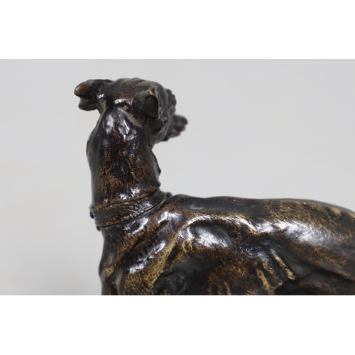 880 - PIERRE-JULES MENE (1810-1879). a 19th century bronze of a Whippet upon an oval base with fan and fol... 
