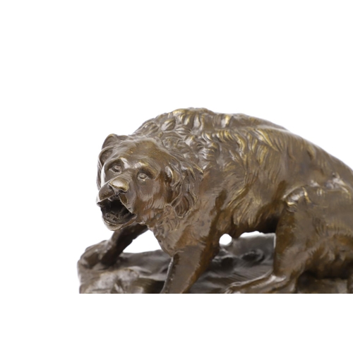 881 - A LATE 19TH CENTURY CONTINENTAL BRONZE OF A BARKING DOG. modelled in a seated pose upon a naturalist... 