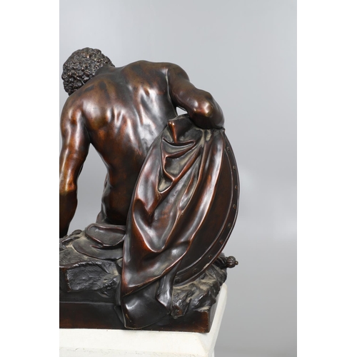885 - AFTER PIERRE JULIEN (1731 - 1804), A LARGE BRONZE STUDY, THE DYING GAUL. the wounded figure collapse... 