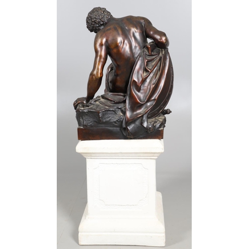 885 - AFTER PIERRE JULIEN (1731 - 1804), A LARGE BRONZE STUDY, THE DYING GAUL. the wounded figure collapse... 