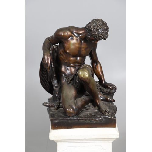 885 - AFTER PIERRE JULIEN (1731 - 1804), A LARGE BRONZE STUDY, THE DYING GAUL. the wounded figure collapse... 