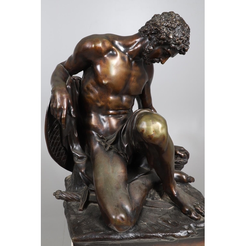 885 - AFTER PIERRE JULIEN (1731 - 1804), A LARGE BRONZE STUDY, THE DYING GAUL. the wounded figure collapse... 
