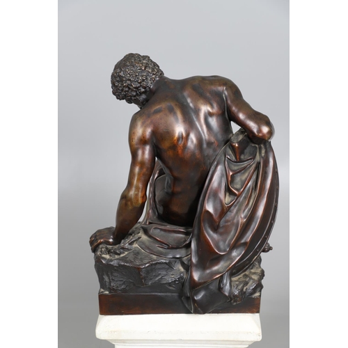 885 - AFTER PIERRE JULIEN (1731 - 1804), A LARGE BRONZE STUDY, THE DYING GAUL. the wounded figure collapse... 