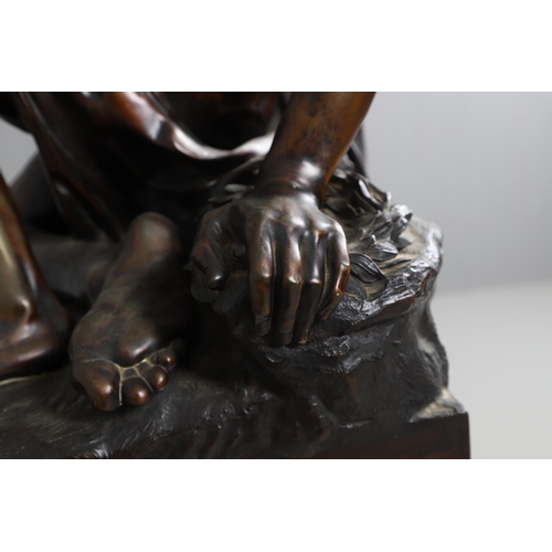 885 - AFTER PIERRE JULIEN (1731 - 1804), A LARGE BRONZE STUDY, THE DYING GAUL. the wounded figure collapse... 