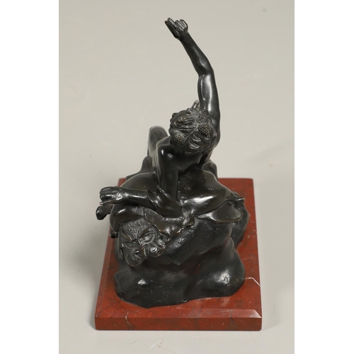 886 - AN ITALIAN BRONZE STUDY OF A BACCHANLIAN FIGURE. 19th century, modelled reclining upon a lion pelt w... 
