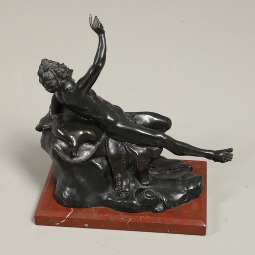 886 - AN ITALIAN BRONZE STUDY OF A BACCHANLIAN FIGURE. 19th century, modelled reclining upon a lion pelt w... 