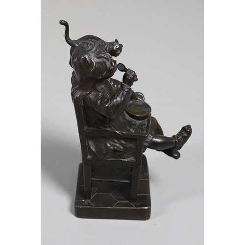 887 - AFTER HENRI FUGERE (1872-1944), BRONZE OF A CHILD. modelled as a seated girl, feeding herself with a... 