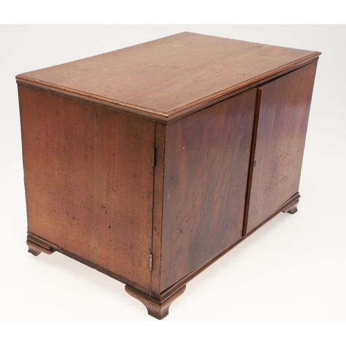 890 - A 19TH CENTURY WALNUT TABLE TOP COLLECTOR'S CABINET. the doors with brass sliding locks enclosing ni... 