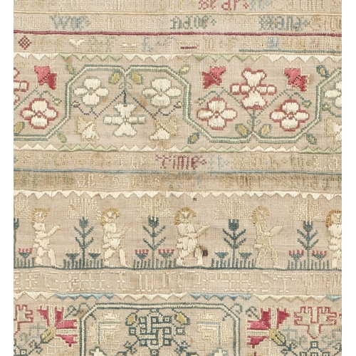 895 - A 19TH CENTURY SILKWORK SAMPLER. finely embroidered with the alphabet, borders of flowers, acorns, l... 