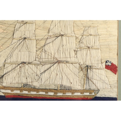 902 - A 19TH CENTURY SAILOR'S WOOLWORK PICTURE. of a clipper ship with three tall masts, within a neutral ... 