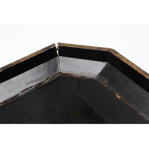 903 - A CHINESE EXPORT LACQUERED GAMES BOX. 19th century, of octagonal form containing seven lidded compar... 