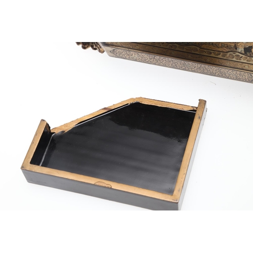 903 - A CHINESE EXPORT LACQUERED GAMES BOX. 19th century, of octagonal form containing seven lidded compar... 