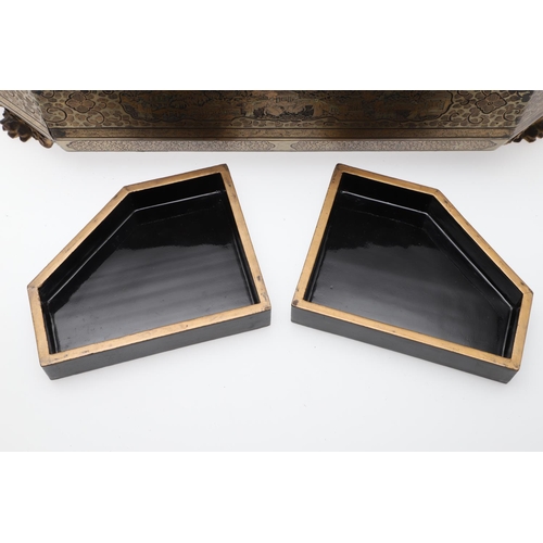 903 - A CHINESE EXPORT LACQUERED GAMES BOX. 19th century, of octagonal form containing seven lidded compar... 