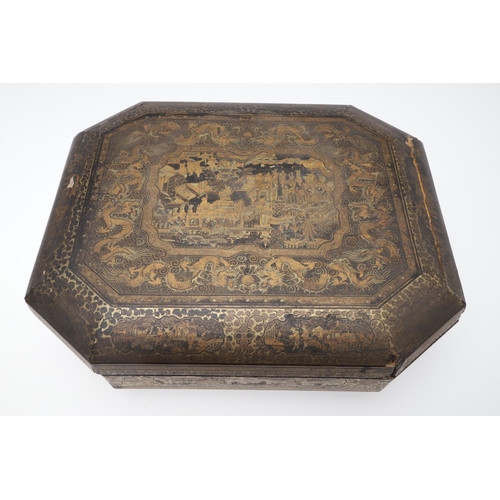 903 - A CHINESE EXPORT LACQUERED GAMES BOX. 19th century, of octagonal form containing seven lidded compar... 