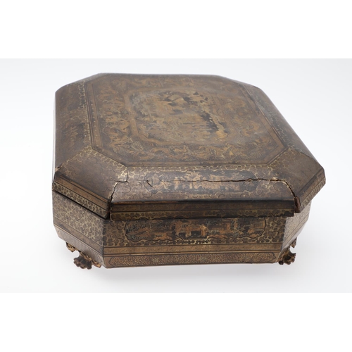 903 - A CHINESE EXPORT LACQUERED GAMES BOX. 19th century, of octagonal form containing seven lidded compar... 
