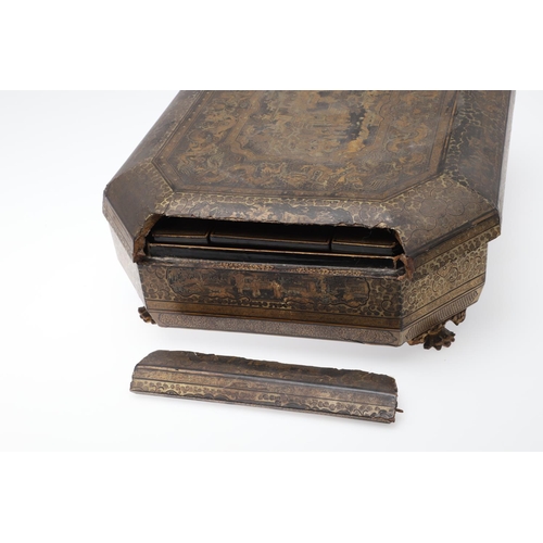 903 - A CHINESE EXPORT LACQUERED GAMES BOX. 19th century, of octagonal form containing seven lidded compar... 