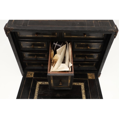 905 - A 17TH CENTURY EBONISED TABLE TOP COLLECTOR'S CABINET. of rectangular form with bone inlaid top and ... 