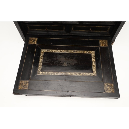 905 - A 17TH CENTURY EBONISED TABLE TOP COLLECTOR'S CABINET. of rectangular form with bone inlaid top and ... 