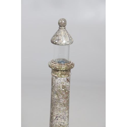 907 - A CORNISH SERPENTINE STONE TABLE LAMP. in the form of a lighthouse upon a rough cut stone base with ... 