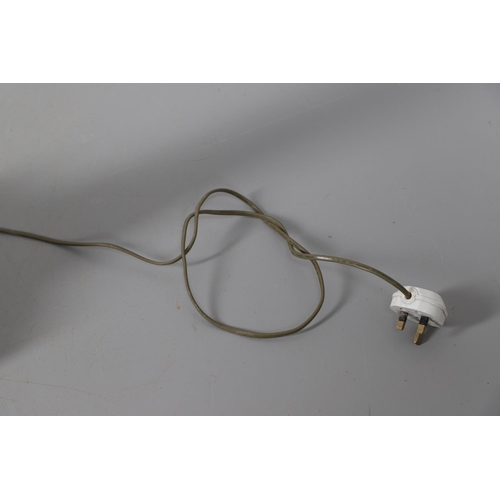 907 - A CORNISH SERPENTINE STONE TABLE LAMP. in the form of a lighthouse upon a rough cut stone base with ... 