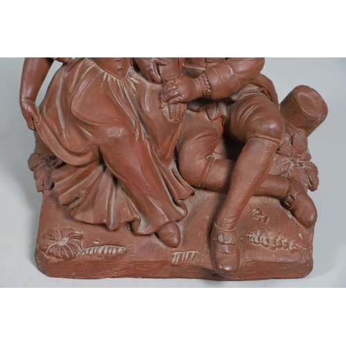 908 - A 19TH CENTURY FRENCH TERRACOTTA GROUP. modelled as a courting couple, seated upon naturalistic base... 