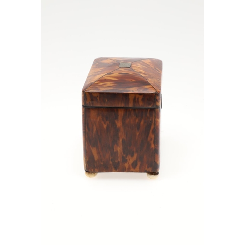 910 - A GEORGE III TORTOISESHELL TEA CADDY. the red velvet lined lid with white metal initialled plaque an... 