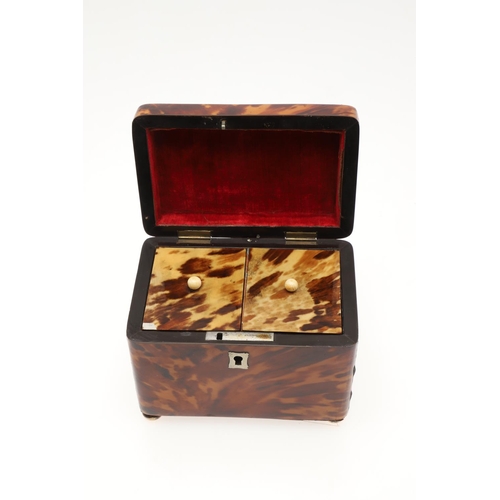910 - A GEORGE III TORTOISESHELL TEA CADDY. the red velvet lined lid with white metal initialled plaque an... 