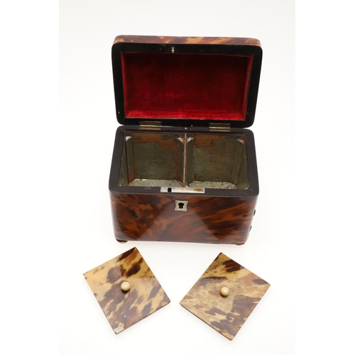 910 - A GEORGE III TORTOISESHELL TEA CADDY. the red velvet lined lid with white metal initialled plaque an... 