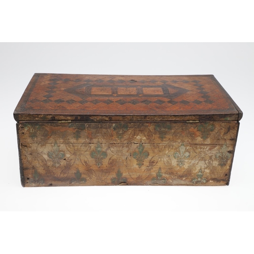 911 - AN ANTIQUE CONTINENTAL PARQUETRY BOX. the hinged lid enclosing a fleur de lys patterned paper lined ... 