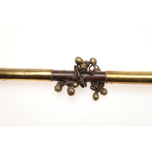 913 - A BRASS MOUNTED MORRIS DANCING SHAKER STICK. probably 19th century, affixed with multiple bells in f... 