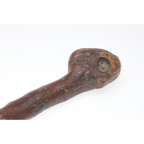 134 - AN IRISH SILVER MOUNTED SHILLELAGH. An Irish Shillelagh of traditional form, the end carved with a t... 